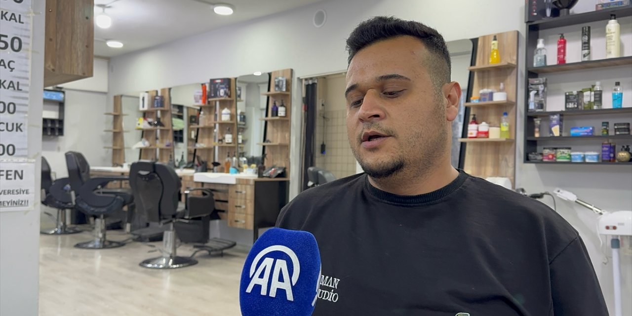 Isparta'da berber dükkanının taşlandığı anlar güvenlik kamerasında