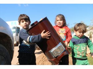TDV'den Suriyeli ailelere soba ve yakacak yardımı
