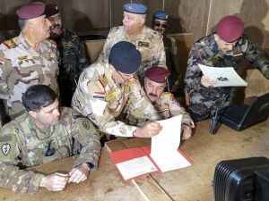 ABD askerlerinin çekildiği Irak'taki Kaim Üssü'nde devir teslim töreni düzenlendi