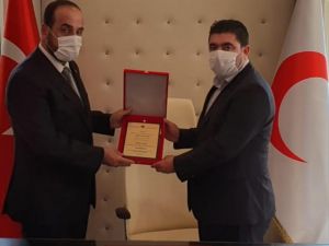 SMDK Başkanı Nasır el-Hariri'den Türk Kızılay şehidinin ailesine ziyaret