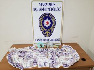 Marmaris'te sahte parayla yakalanan İngiliz turist gözaltına alındı