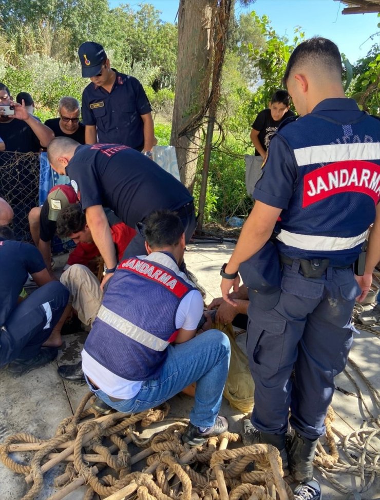 Bodrum'da evini yaktıktan sonra kendisini kuyuya atan kişi itfaiye ekiplerince kurtarıldı