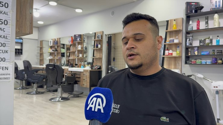 Isparta'da berber dükkanının taşlandığı anlar güvenlik kamerasında